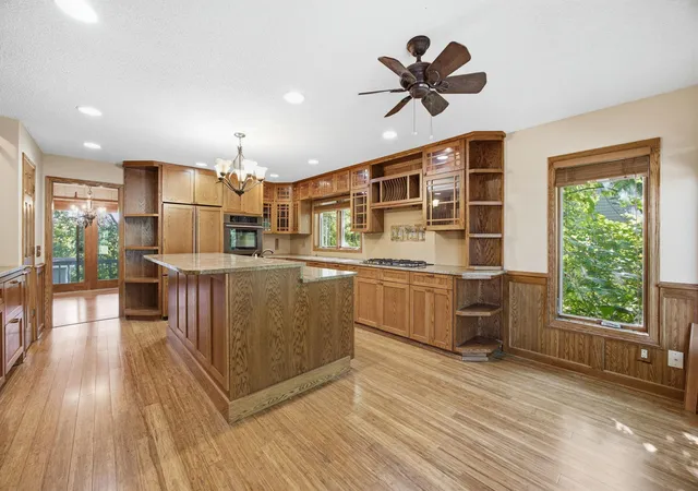 Photo 2 of Single family home for sale at 8031 Tierneys Woods Curv, Minneapolis, MN 55438 | MLS# 7005035 | Listing updated on 2026-09-16
