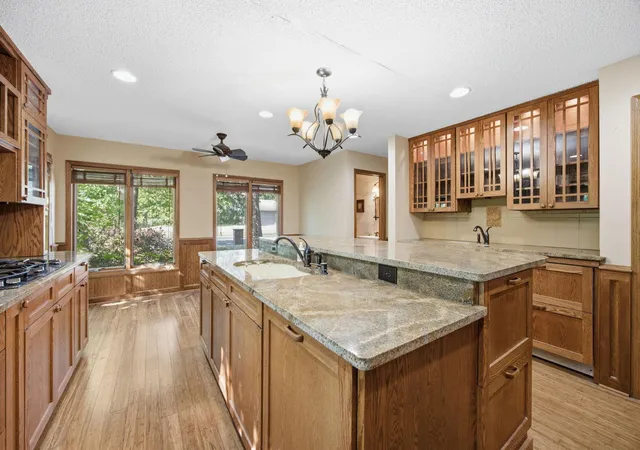 Photo 4 of Single family home for sale at 8031 Tierneys Woods Curv, Minneapolis, MN 55438 | MLS# 7005035 | Listing updated on 2026-09-16