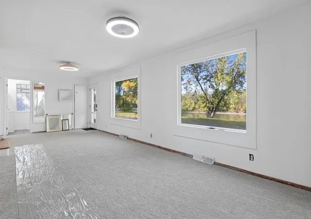 Photo 2 of Single family home for sale at 8065 Riverview Ter Ne, Minneapolis, MN 55432 | MLS# 7054458 | Listing updated on 2026-10-11