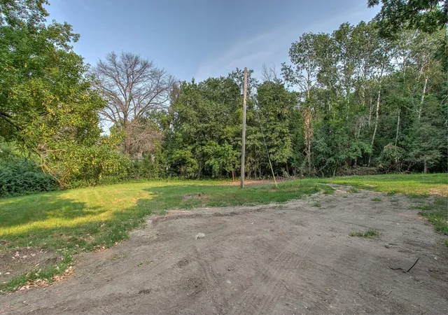 Photo 4 of Land for sale at 949 89th Lane NW, Minneapolis, MN 55433 | MLS# 7060280 | Listing updated on 2026-09-16