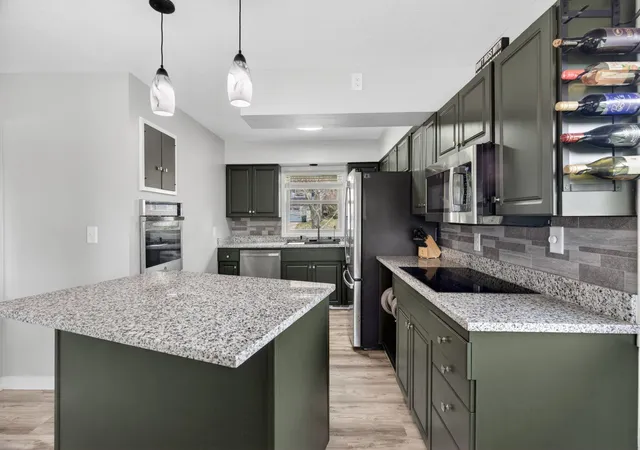 Photo 2 of Single family home for sale at 1561 11th Avenue Ne, Rochester, MN 55906 | MLS# 7061537 | Listing updated on 2026-08-25