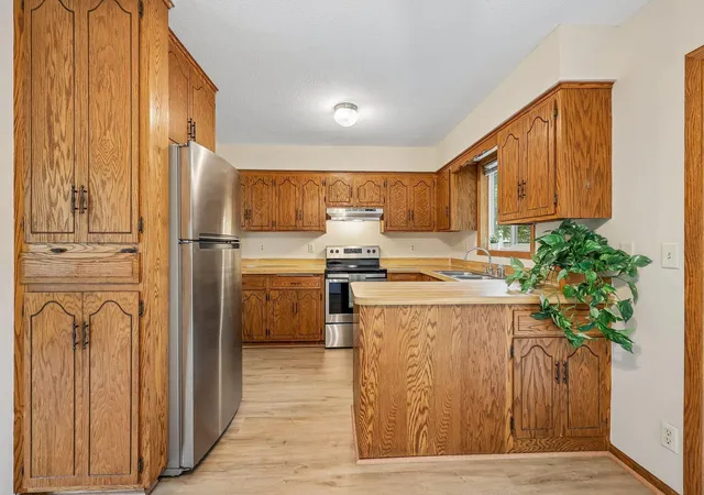Photo 2 of Townhouse for sale at 13008 Oliver Ave S, Burnsville, MN 55337 | MLS# 7078894 | Listing updated on 2026-09-28