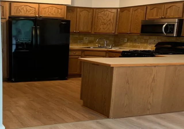 Photo 3 of Townhouse for sale at 6908 Unity Ave N, Minneapolis, MN 55429 | MLS# 7078975 | Listing updated on 2026-10-23