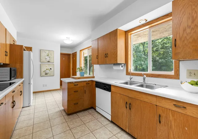 Photo 3 of Sale Pending at 408 Woodland Dr, Burnsville, MN 55337 | MLS# 7087614 | Listing updated on 2026-08-10