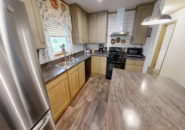 Photo 3 of Single family home for sale at 211 Farmdale Ave, Lake Lillian, MN 56253 | MLS# 7092301 | Listing updated on 2026-08-27