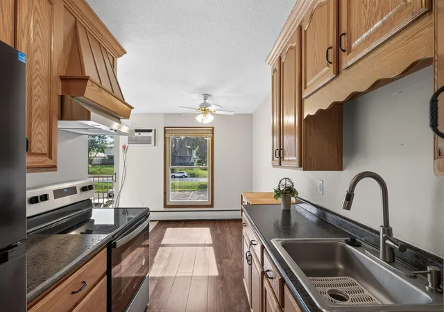 Listing Photo 4 - Condo for sale in building located at 921 11th Ave S, Hopkins, MN 55343 - Unit #5