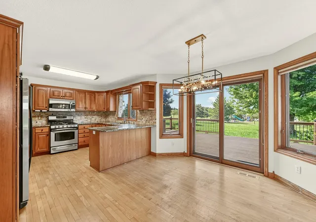 Photo 3 of Single family home for sale at 1110 Southern Hills Ln SW, Rochester, MN 55902 | MLS# 7102437 | Listing updated on 2026-09-21