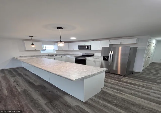 Photo 3 of Multi family home for sale at 1911 E 32nd Street, Minneapolis, MN 55407 | MLS# 7103611 | Listing updated on 2026-08-07
