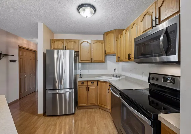 Listing Photo 4 - Condo for sale in building located at 6613 162nd Ct, Rosemount, MN 55068 - Unit #323