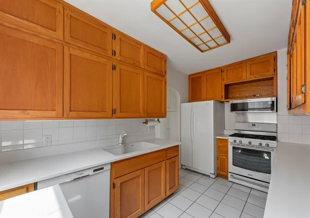 Listing Photo 5 - Condo for sale in building located at 4612 Bloomington Ave, Minneapolis, MN 55407