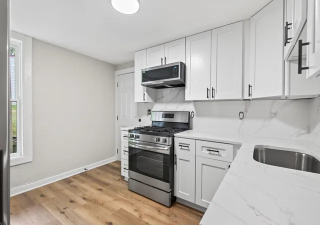 Listing Photo 5 - Condo for sale in building located at 2218 Irving Ave N, Minneapolis, MN 55411
