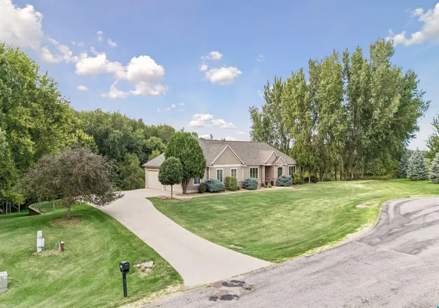 Photo 3 of Single family home for sale at 1057 Ridge Crst Ln NW, Rochester, MN 55901 | MLS# 7113700 | Listing updated on 2026-09-03