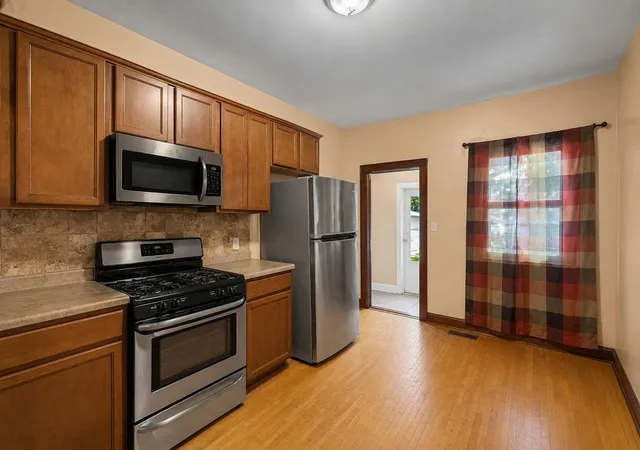 Photo 3 of Single family home for sale at 1625 Polk St NE, Minneapolis, MN 55413 | MLS# 7113800 | Listing updated on 2026-07-24