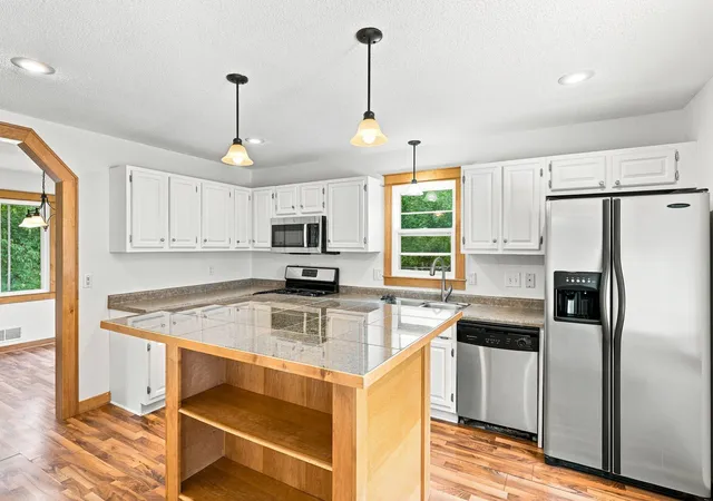 Photo 3 of Single family home for sale at 13412 Arden Cir, Burnsville, MN 55337 | MLS# 7113878 | Listing updated on 2026-10-10