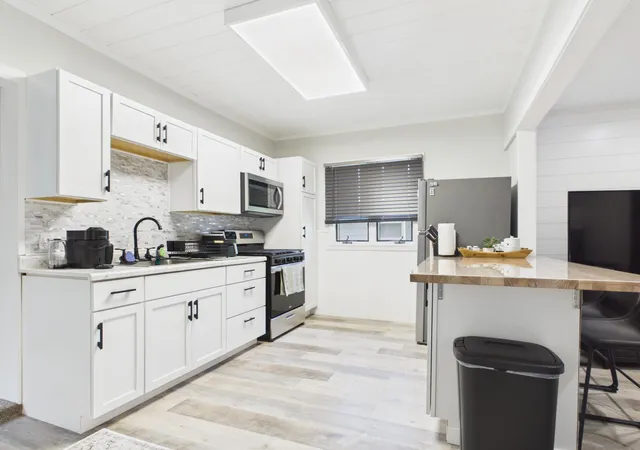 Photo 3 of Single family home for sale at 410 Quincy St, Alexandria, MN 56308 | MLS# 7114089 | Listing updated on 2026-09-24
