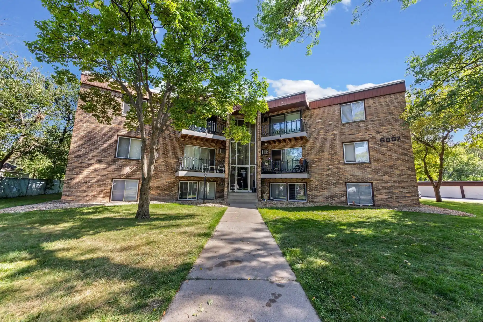 Listing Photo 1 - Condo for sale in 6007 W Broadway Ave located at 6007 W Broadway Ave, New Hope, MN 55428 - Unit #303