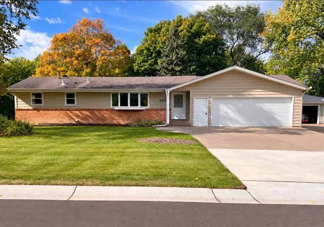 Photo 1 of Single family home for sale at 6573 Berkshire Ln N, Maple Grove, MN 55311 | MLS# 7115312 | Listing updated on 2026-10-03