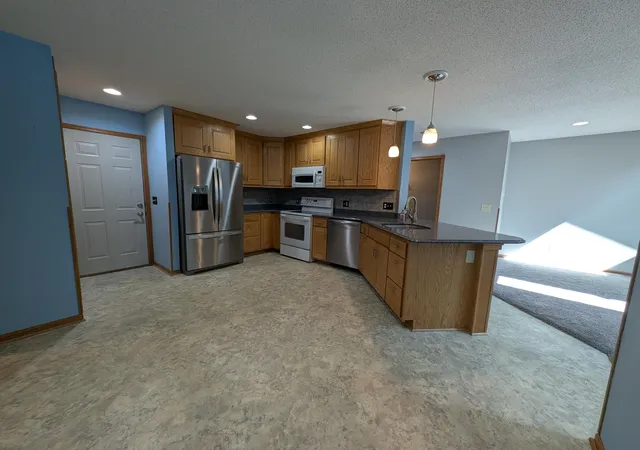 Photo 3 of Single family home for sale at 2628 Viola Hts Dr NE, Rochester, MN 55906 | MLS# 7115769 | Listing updated on 2026-09-13
