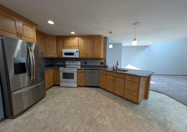 Photo 4 of Single family home for sale at 2628 Viola Hts Dr NE, Rochester, MN 55906 | MLS# 7115769 | Listing updated on 2026-09-13
