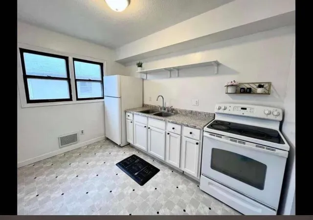 Photo 3 of Multi family home for sale at 1176 Norton St, Saint Paul, MN 55117 | MLS# 7119926 | Listing updated on 2026-08-04