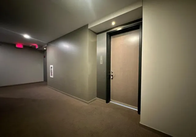 Listing Photo 2 - Condo for sale in building located at 1211 Lagoon Ave, Minneapolis, MN 55408 - Unit #405