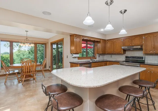 Photo 3 of Single family home for sale at 100 Marcin Ln, Burnsville, MN 55337 | MLS# 7121726 | Listing updated on 2026-10-20