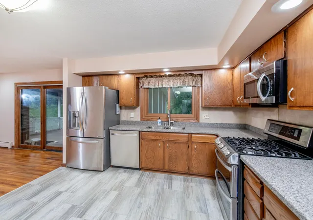 Photo 1 of Single family home for sale at 1801 River Hills Dr, Burnsville, MN 55337 | MLS# 7124350 | Listing updated on 2026-10-18