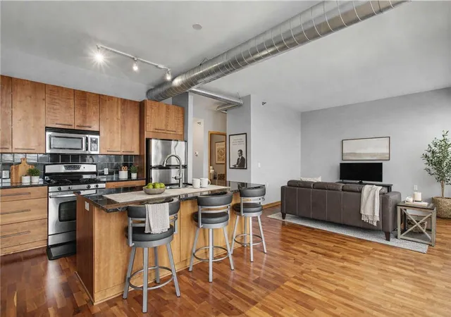 Photo 1 of Condo for sale at 1211 Lagoon Ave #410, Minneapolis, MN 55408 | MLS# 7126987 | Listing updated on 2026-09-03
