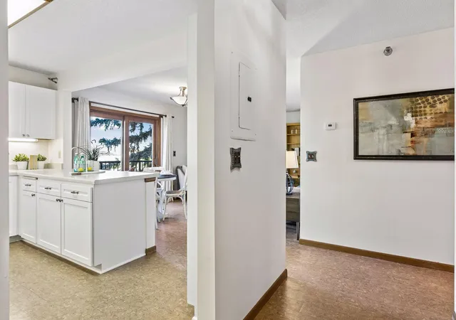 Listing Photo 1 - Condo for sale in building located at 1666 Coffman St, Falcon Heights, MN 55108 - Unit #215