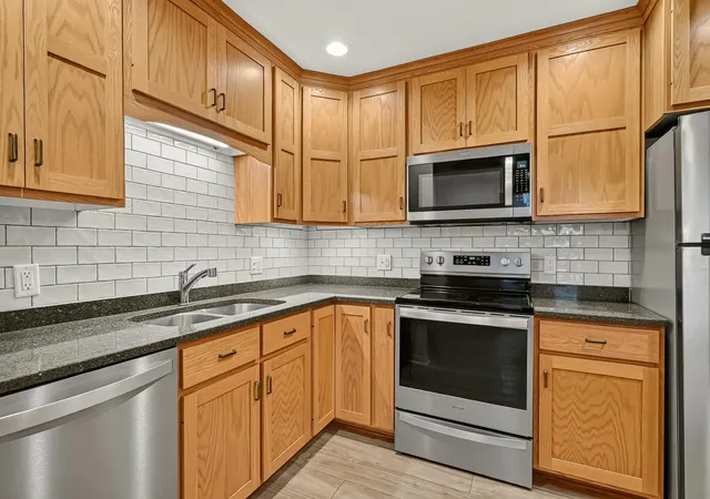 Listing Photo 1 - Condo for sale in building located at 317 SW 6th Ave SW, Rochester, MN 55902 - Unit #209