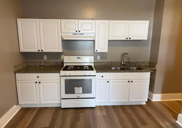 Photo 3 of Multi family home for sale at 1016 Newton Ave N, Minneapolis, MN 55411 | MLS# 7135334 | Listing updated on 2026-10-08