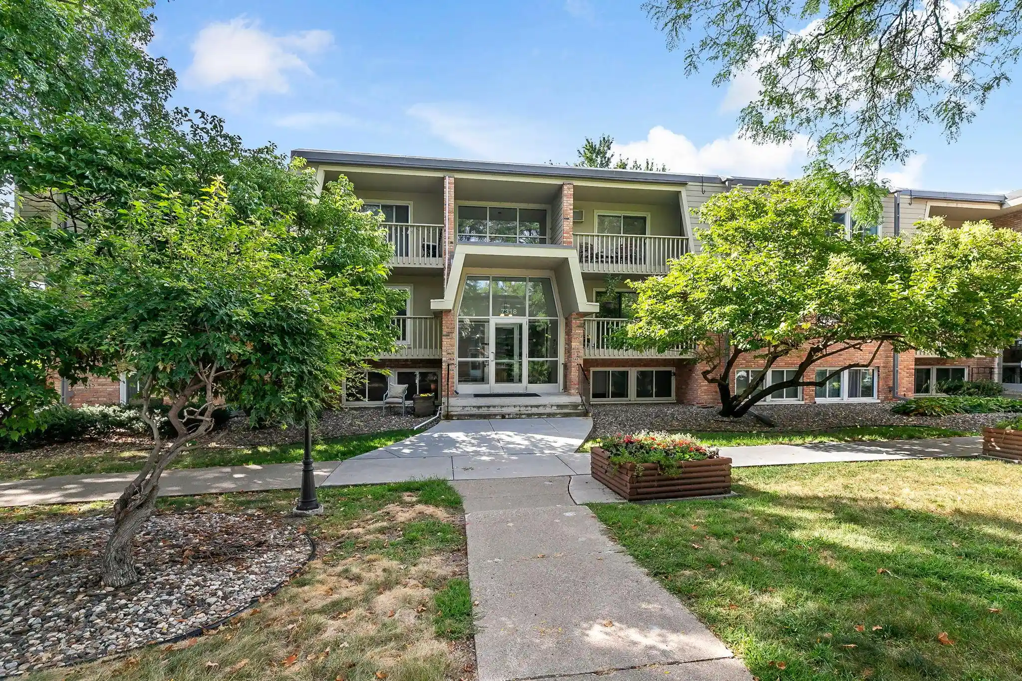 Listing Photo 1 - Condo for sale in 7318 W 22nd St located at 7318 W 22nd St, St. Louis Park, MN 55426 - Unit #111