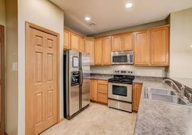 Photo 2 of Single family home for sale at 11040 Fergus St Ne #E, Minneapolis, MN 55449 | MLS# 7136548 | Listing updated on 2026-09-16