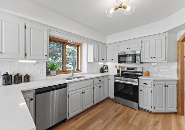 Photo 3 of Single family home for sale at 5619 Dunlap Ave N, Saint Paul, MN 55126 | MLS# 7136705 | Listing updated on 2026-09-02