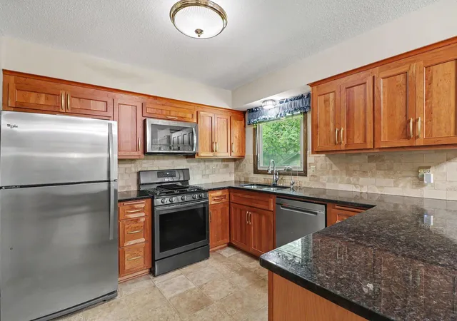 Photo 3 of Single family home for sale at 2001 102nd Avenue Nw, Minneapolis, MN 55433 | MLS# 7137486 | Listing updated on 2026-10-09