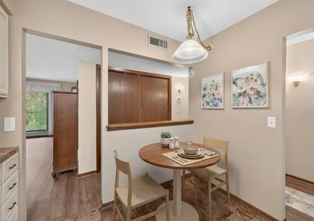 Listing Photo 1 - Condo for sale in building located at 2465 Londin Ln E, Maplewood, MN 55119 - Unit #212