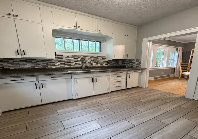Photo 3 of Single family home for sale at 1034 University Dr N, Fargo, ND 58102 | MLS# 7138085 | Listing updated on 2026-09-04
