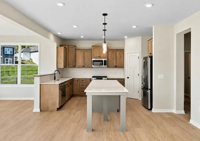 Photo 2 of Single family home for sale at 1149 Woods Crk Dr, Delano, MN 55328 | MLS# 7138201 | Listing updated on 2026-09-21