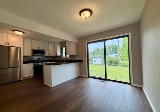 Photo 4 of Single family home for sale at 1612 69th Avenue N, Minneapolis, MN 55430 | MLS# 7140914 | Listing updated on 2026-09-19