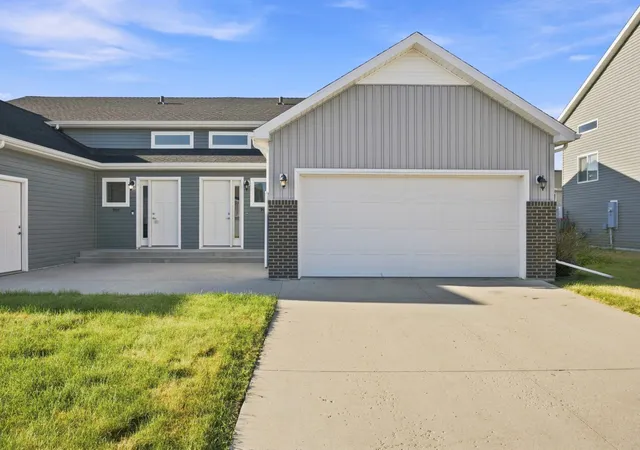 Photo 1 of Townhouse for sale at 911 Eaglewood Ave W, West Fargo, ND 58078 | MLS# 7141898 | Listing updated on 2026-09-15