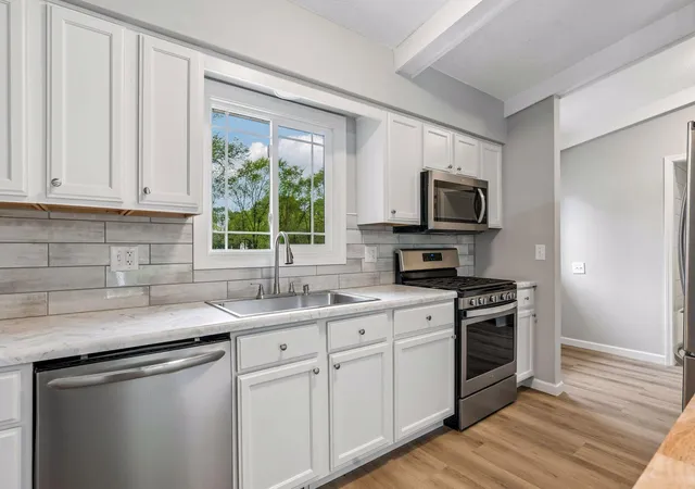 Photo 3 of Single family home for sale at 10664 Kyle Ave N, Minneapolis, MN 55443 | MLS# 7142587 | Listing updated on 2026-09-12
