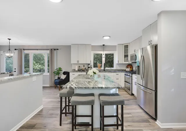Photo 2 of Single family home for sale at 14104 Knollway Dr N, Hopkins, MN 55305 | MLS# 7143914 | Listing updated on 2026-10-08