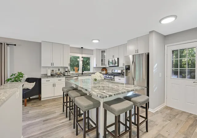 Photo 3 of Single family home for sale at 14104 Knollway Dr N, Hopkins, MN 55305 | MLS# 7143914 | Listing updated on 2026-10-08