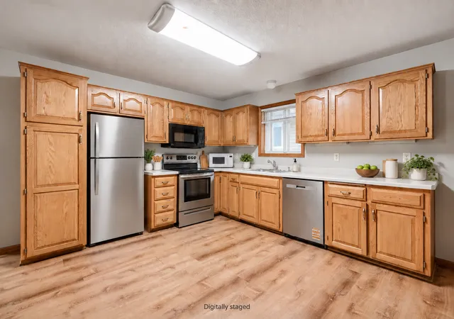 Photo 3 of Single family home for sale at 402 Lady Slipper Ave NE, New Prague, MN 56071 | MLS# 7147360 | Listing updated on 2026-09-28