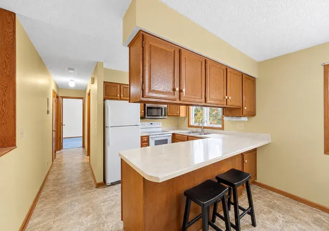 Photo 4 of Single family home for sale at 305 Wacker Dr, Glencoe, MN 55336 | MLS# 7148389 | Listing updated on 2026-10-23