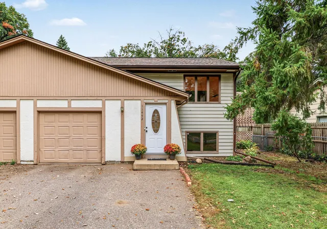 Photo 3 of Townhouse for sale at 11442 Osage St NW, Minneapolis, MN 55433 | MLS# 7148750 | Listing updated on 2026-10-08
