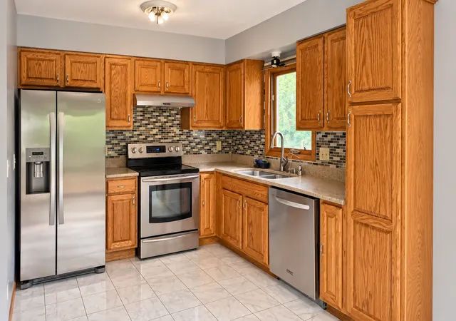 Photo 2 of Sale Pending at 5316 Brookdale Dr N, Minneapolis, MN 55443 | MLS# 7148882 | Listing updated on 2026-10-21