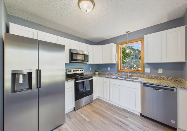 Photo 4 of Single family home for sale at 7081 Upper 36th St N, Saint Paul, MN 55128 | MLS# 7148941 | Listing updated on 2026-09-29