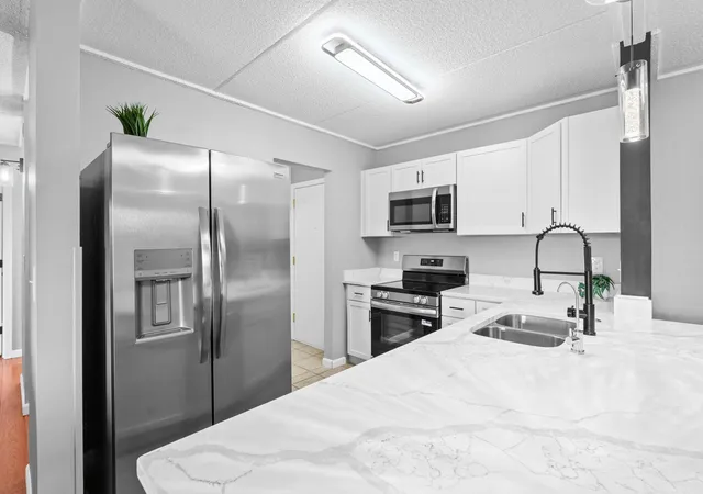 Photo 3 of Condo for sale at 10501 Cedar Lake Rd #512, Hopkins, MN 55305 | MLS# 7149556 | Listing updated on 2026-10-09
