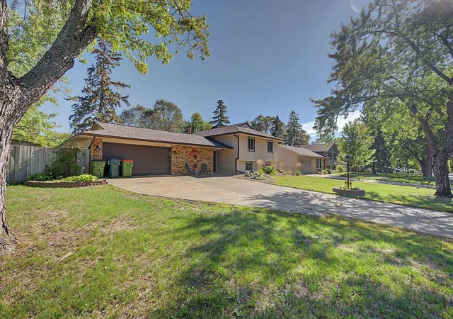 Photo 1 of Single family home for sale at 10496 Thrush St NW, Minneapolis, MN 55433 | MLS# 7149639 | Listing updated on 2026-10-10
